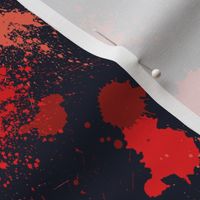 Paint or blood splatter on dark blue