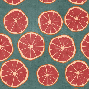 blood oranges on teal