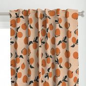 mid-century clementines on sandy beige