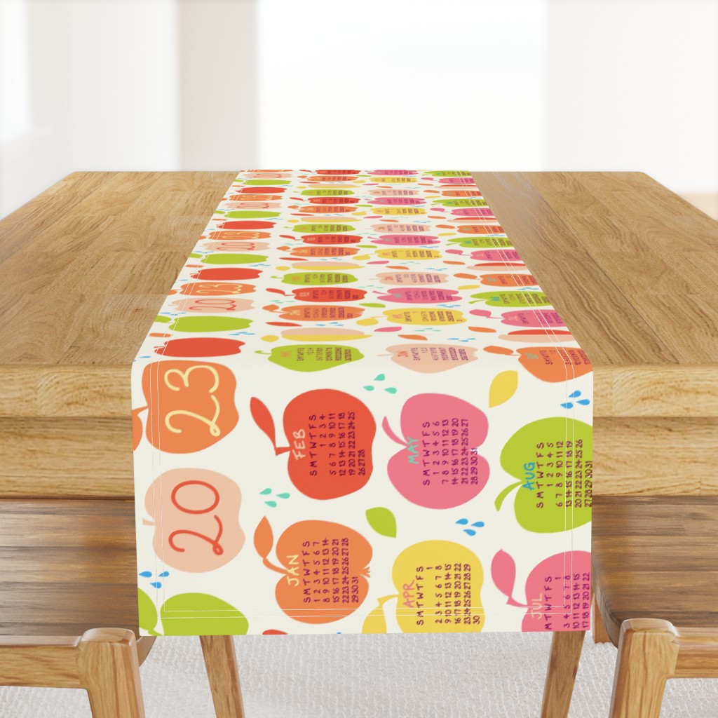 An apple a day 2023 FQ linen tea towel in orange by Pippa Shaw