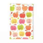 An apple a day 2023 FQ linen tea towel in orange by Pippa Shaw