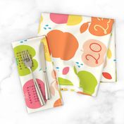 An apple a day 2023 FQ linen tea towel in orange by Pippa Shaw