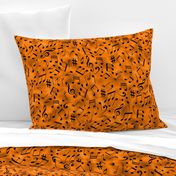 scattered music notes on orange