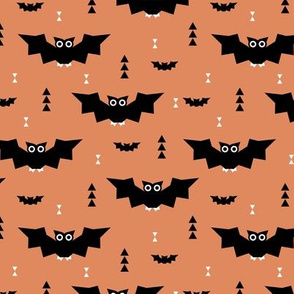 Cute little kawaii bat geometric triangles and halloween themed pumpkin orange kids design