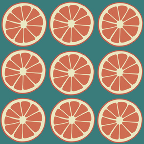 Tropical fruit, citrus fruit, blood orange slices on blue green 