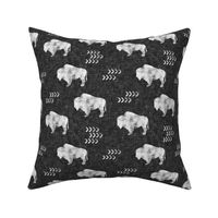 (2" scale) distressed buffalo on dark grey linen C19BS