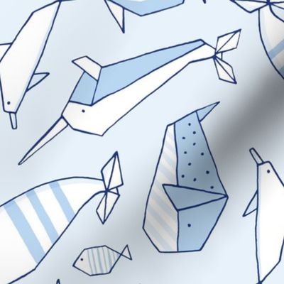Origami whales in blue