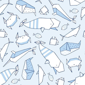 Origami whales in blue