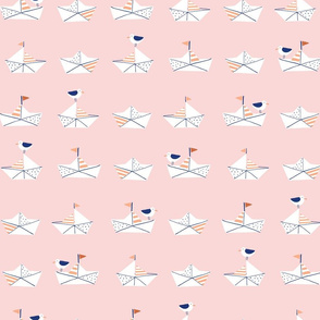 Paper boats in pink