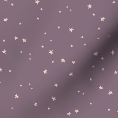 Pink stars on purple background