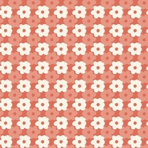 Small flowers in a burnt orange background