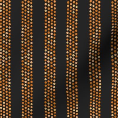 Dots and stripes in orange and black