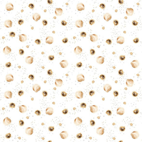 Beige seashells on sand