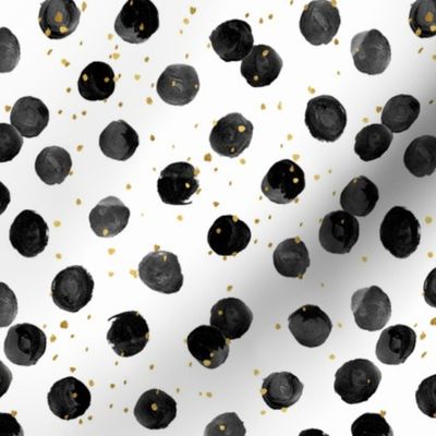 Black dots with gold sprinkles