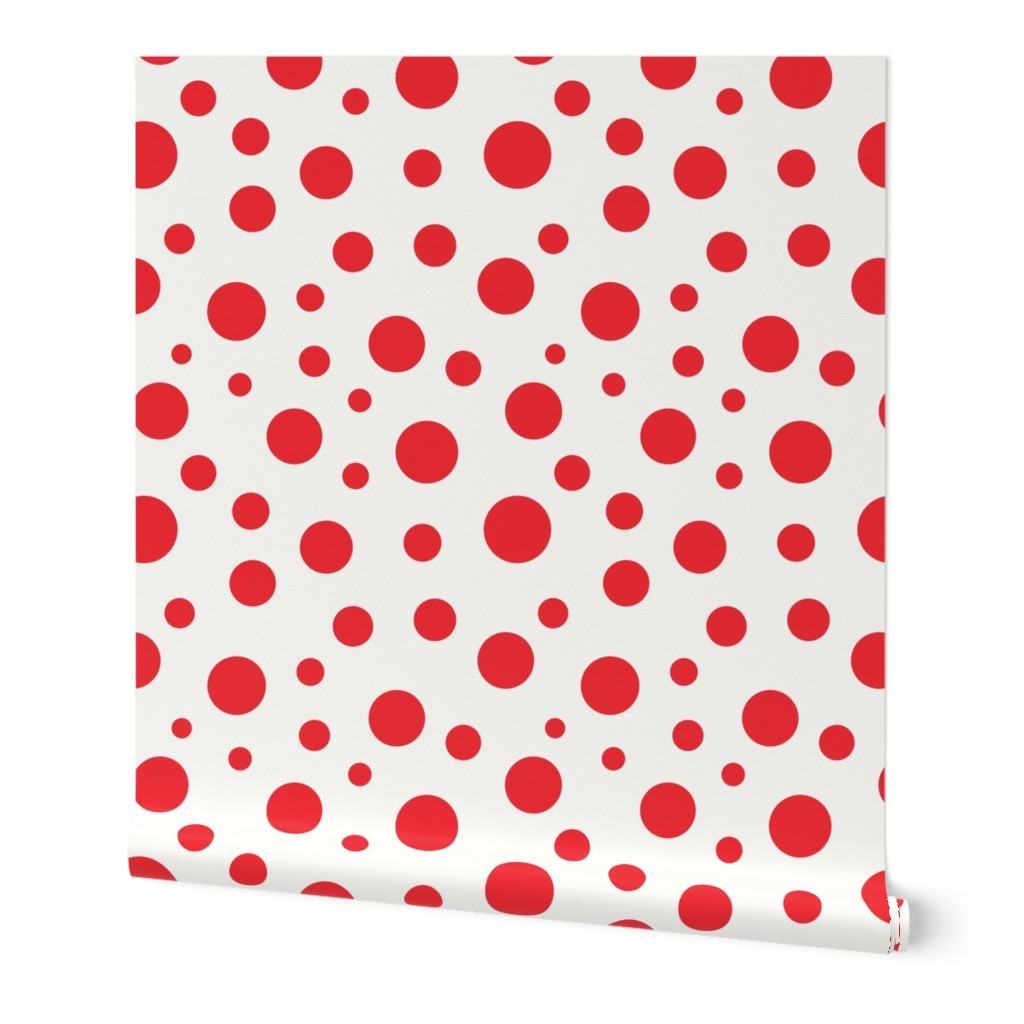 Red dots confetti over beige background