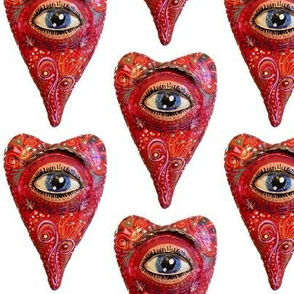 folk art heart with eye, white red blue