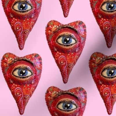 folk art heart with eye, red pink blue