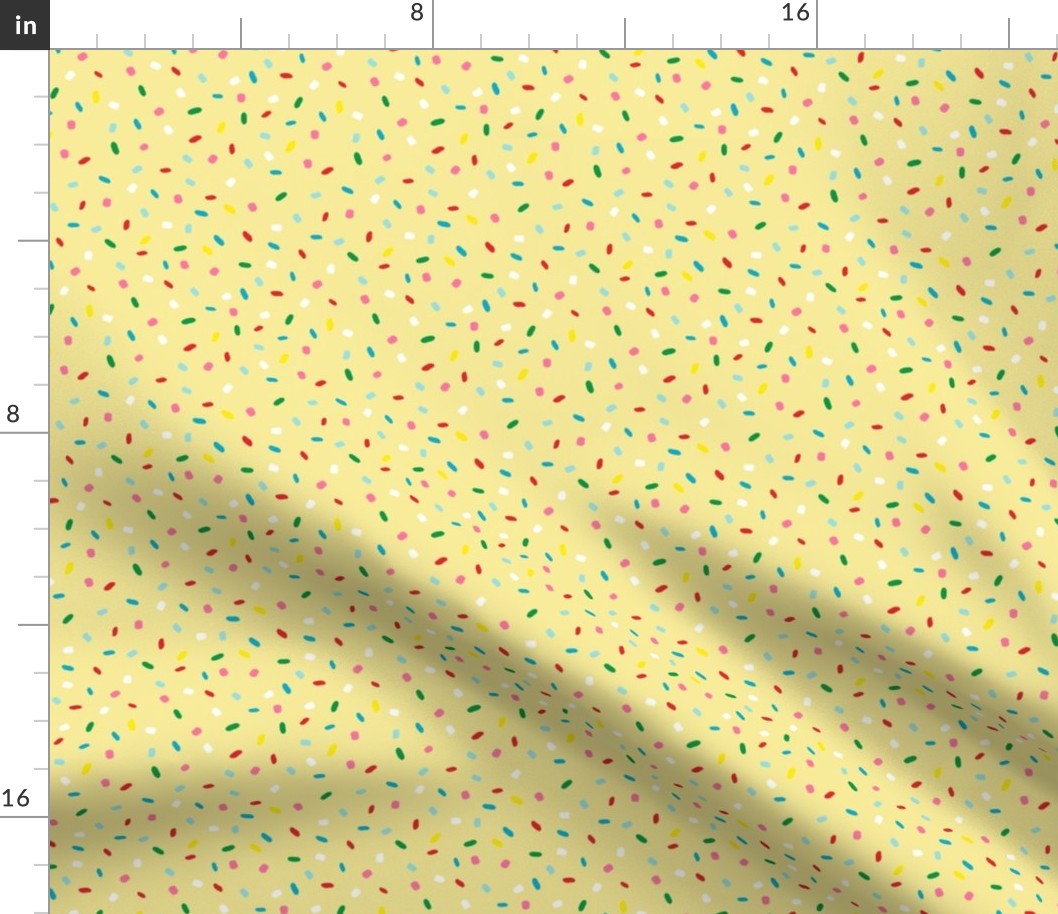 glazed with colorful sprinkles on yellow melting icing seamless pattern