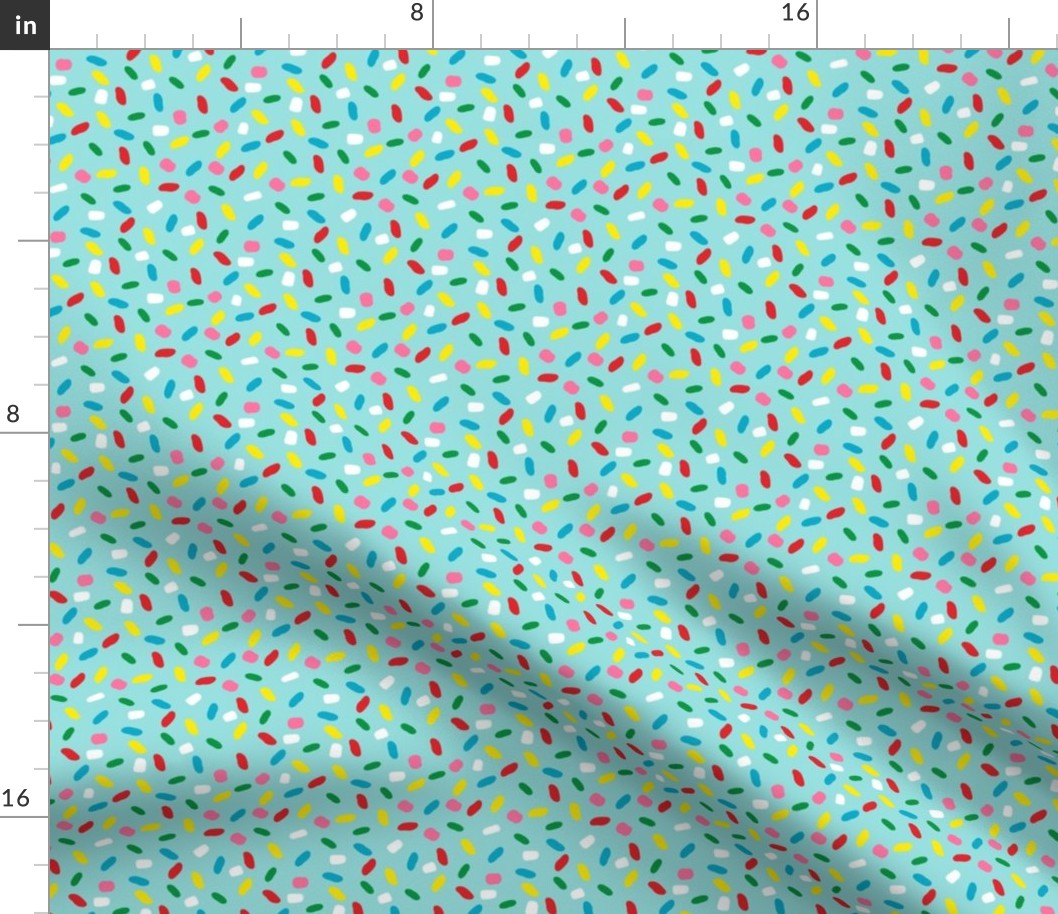 Sweet glazed, with colorful sprinkles on blue melting icing seamless pattern