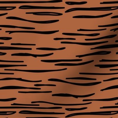 Abstract waves zebra stripes animal print or ocean wave sea life design autumn winter copper rust brown black