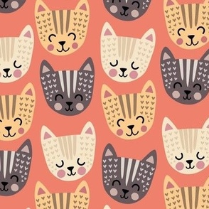 Happy scandi tabby cats on coral
