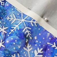 blue snowflake in blue and white watercolor