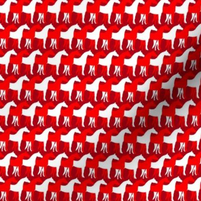 One Inch White and Red Overlapping Horses on Dark Red