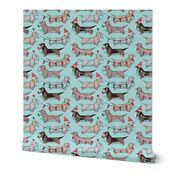 Small scale // Origami Christmas Dachshunds sausage dogs // aqua background