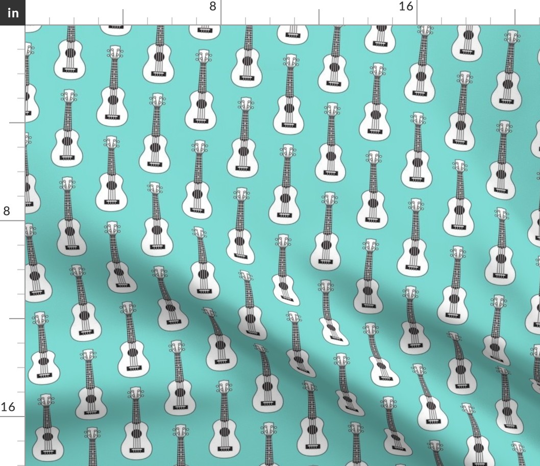 ukuleles on teal