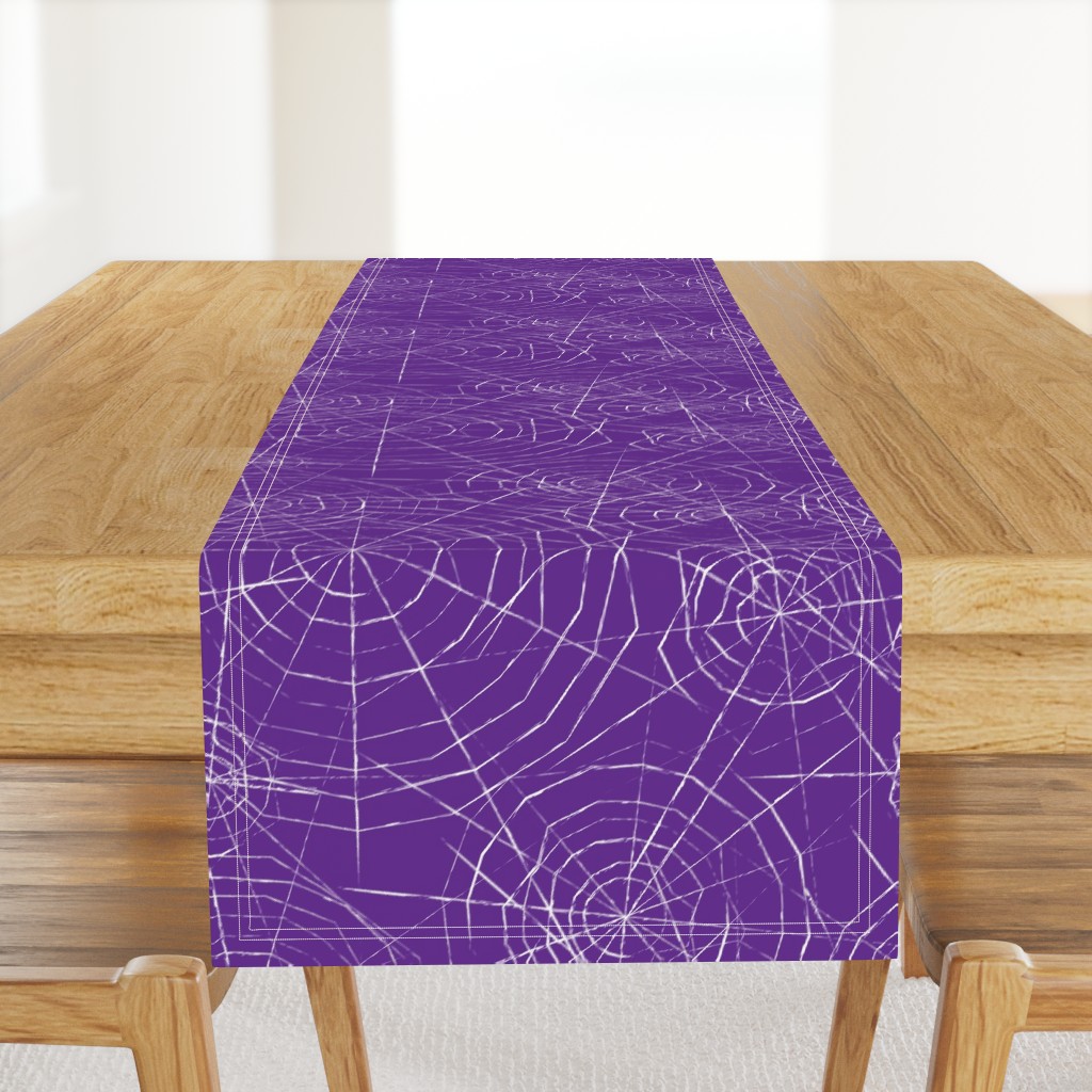 spiderwebs on purple