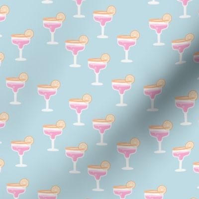 Girls night out cocktail glass birthday celebration cheers and manhattan cosmopolitan drinks orange pink blue
