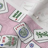Mahjong Tiles on Pale Pink with Swirls Background