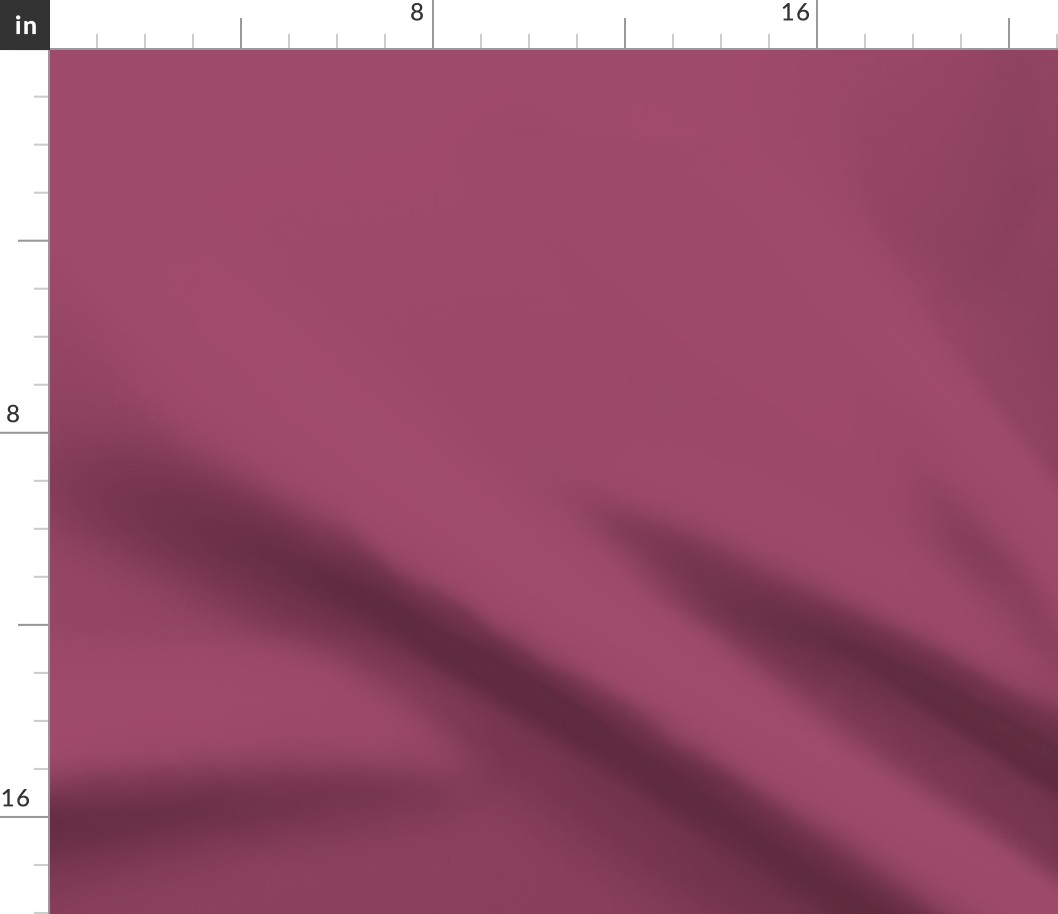 solid  faded raspberry red (#9C4866)