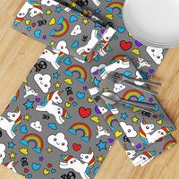 Mystical Cartoon Unicorns skulls and Rainbows on gray