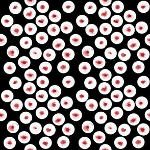 red and white circles on blck in water color