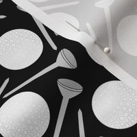 golf balls and tees grayscale