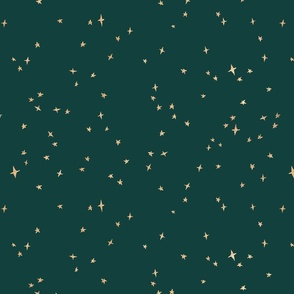 gold metallic look stars wallpaper and fabric on deep green