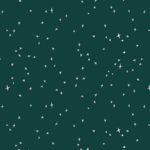 Scattered silver metallic stars on fir