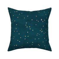 Scattered gold metallic look celestial stars on peacock blue textured