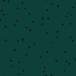 Black scattered stars on fir green