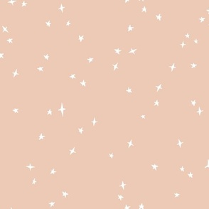 white scattered stars on bisque