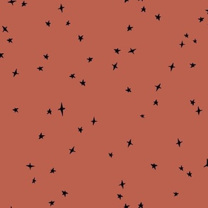 black scattered stars on rouge red