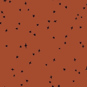 black scattered stars on saffron