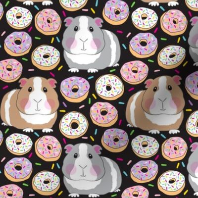 guinea pigs and white purple pink sprinkle donuts on black