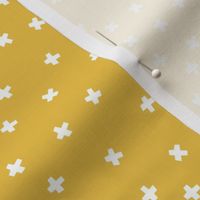 Geometric white cross stars on mustard yellow