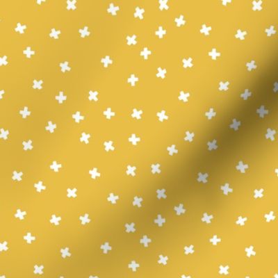 Geometric white cross stars on mustard yellow