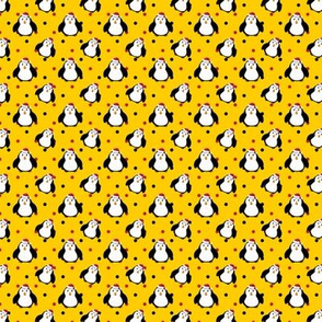 Penguins in christmas mood on yellow