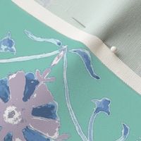 Flower motif in turquoise, lavender, plum mauve and white.