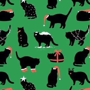 Holiday black cats. Snowman, Santa Claus, Christmas tree, a gift.