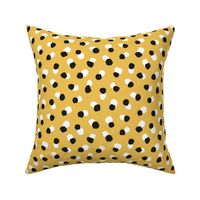 Abstract spots and dots abstract animal print trend design black and white ochre yellow